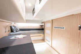 Fjord 44 open | B2: Guest cabin with 2 berth, shelf and 2 openable portholes. | Fjord